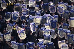 The fans of Porto keep portraits of their players from kicking off.