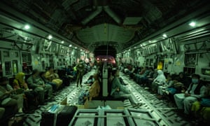 Australian citizens and visa holders are made comfortable by ADF personnel as they board the Royal Australian Air Force C-17A Globemaster preparing to depart Hamid Karzai International Airport.