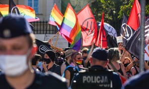 Showing solidarity … activists protest against an anti-LGBT far-right rally in Warsaw, on 16 August.