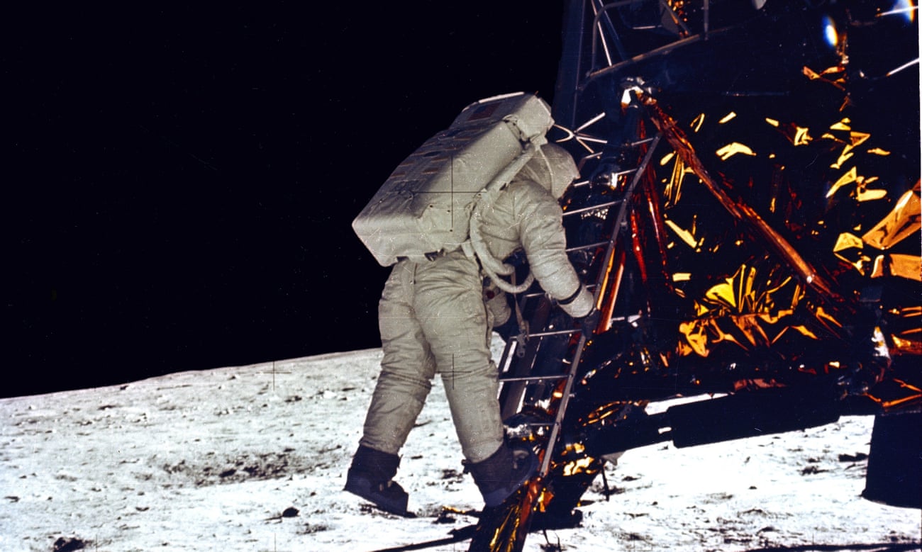 Buzz Aldrin descends from the lunar module.