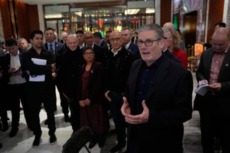 Keir Starmer speaking to the business delegation travelling with him at a hotel in Beijing, China.