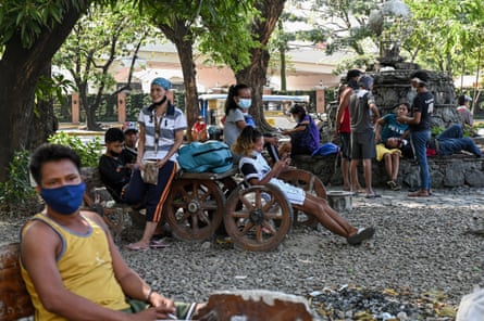Homeless people wait for potential employers and food rations. Liwasang Bonifacio is one of Manila’s ‘freedom parks’, where permission is not required to hold gatherings