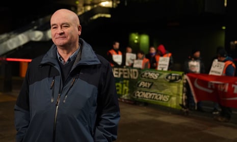 Mick Lynch, general secretary of the RMT, on the picket line outside Euston train station.