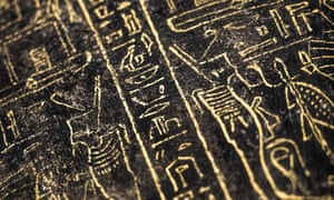 Hieroglyphs carved on a black wooden sarcophagus inlaid with gilded sheets, dating back to between the seventh and fourth centuries BC.