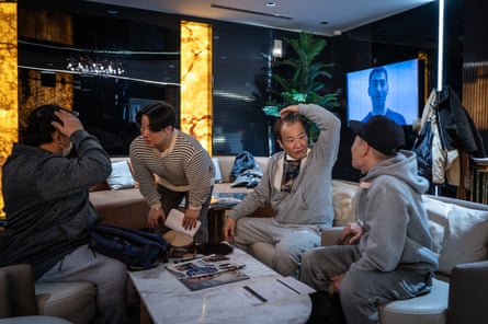 Men talking on sofas