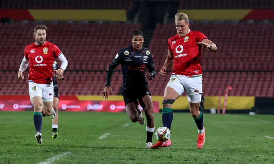 British &amp; Irish Lions’ Duhan Van der Merwe chases a loose ball to score a try.