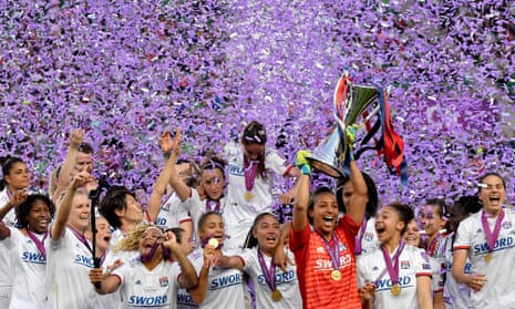 Lyon players celebrate after defeating Barcelona in last year’s Champions League final