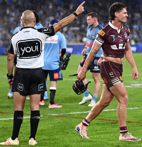 Kalyn Ponga of the Maroons is sent off by referee Ashley Klein.