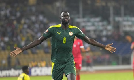 Cheikhou Kouyaté runs away in celebration. 