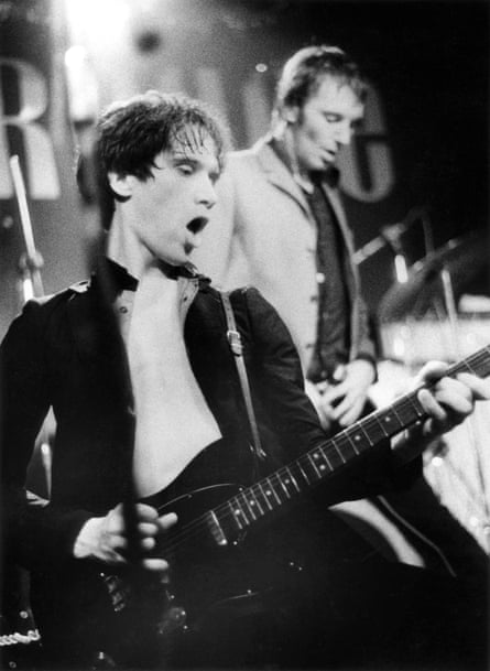 Wilko Johnson on stage with Dr Feelgood at the Marquee Club, London in the 1970s. Fast, cutting beats became his stock.