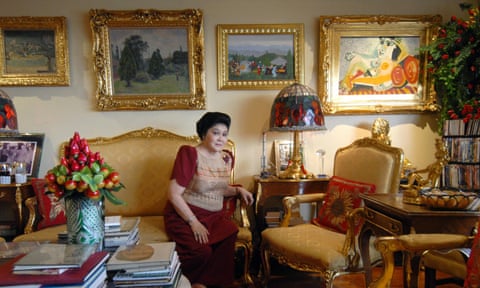 Imelda Marcos in her Manila apartment in 2007, surrounded by paintings including a Picasso