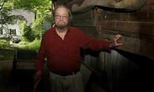 In a 2006 photo, Donald Hall, author of numerous poetry books, poses in the barn of the 200-year-old Wilmot farm that has been in his family for four generations.