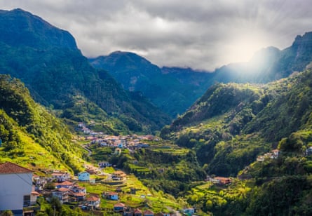 Panoramic aerial view over Lombo Galego village on high altitude on mountain. Madeira island, Portugal
