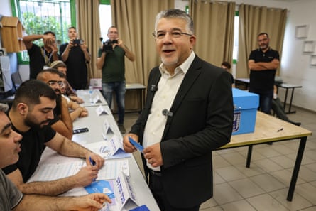 Yousef Jabareen casting his ballot in the Arab-Israeli town of Umm al-Fahm.