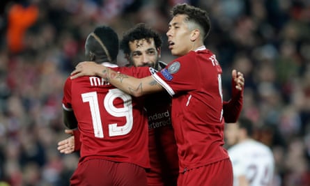 Sadio Mané, Mohamed Salah and Roberto Firmino embrace in celebration during Liverpool’s victory over Roma in April 2018. The trio formed a hugely impressive frontline during their five years together at Anfield