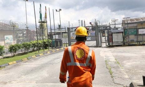 rear view of employee at an oil flow station operated by Shell in Port Harcourt