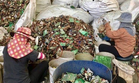 Electronic circuit boards are sorted at a site in Thailand