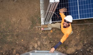Jarrod Smith from solar company 5B installing solar and battery energy systems at Peak Alone, near Cobargo, New South Wales, Australia