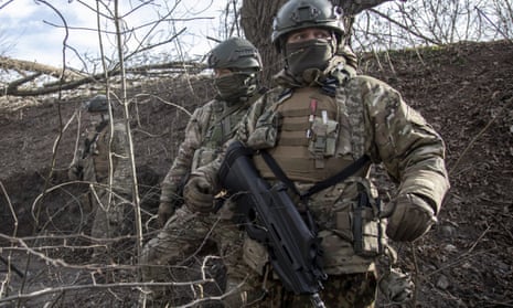 Ukrainian servicemen are seen in the Toretsk frontline in Donbas.