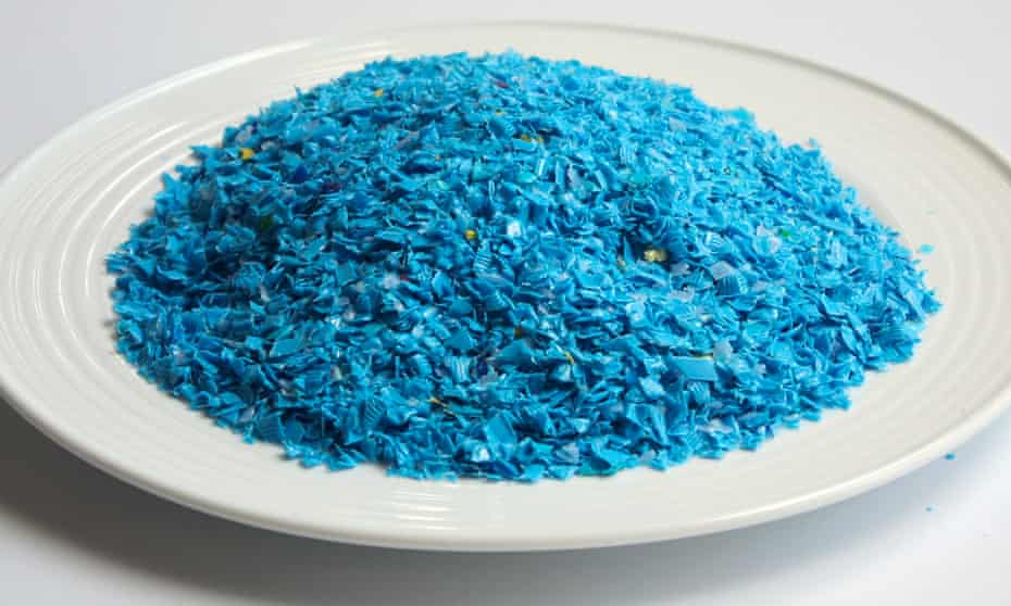 Recycled, shredded plastic is pictured on a dinner plate, equivalent to the amount of microplastic a person could consume in a year, according to a WWF study. 
