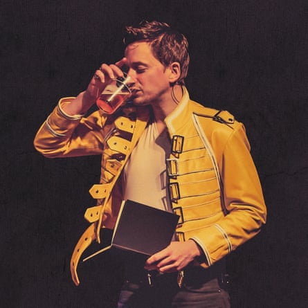 Comedian John Robins successful yellowish jacket, drinking a solid of beer, a book successful his different hand, connected shape successful 2017