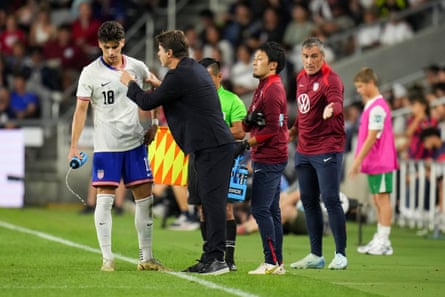 United States’ Max Arfsten (18) speaks with head coach Mauricio Pochettino during the first half of a friendly soccer match against Japan, Tuesday, Sept. 9, 2025.