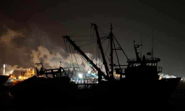 Industrial chimneys of fish meal are seen at Peru’s northern port of Chimbote.