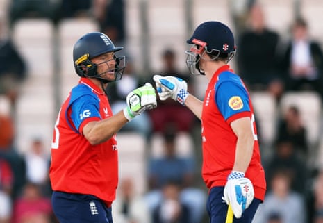 England's Jos Buttler (left) celebrates with Harry Brook after reaching his half century.