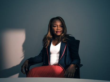 a woman in a white shirt and a blazer