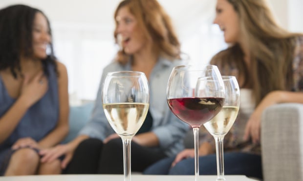 three young women and three glasses of wine