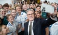 Labour leader Sir Keir Starmer poses for ‘selfies’ with student nurses and trainee medics during a visit to Three Counties medical school in Worcester.