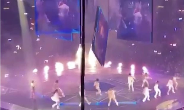 A video screen falls on to performers at a concert of Cantopop boy band Mirror in Hong Kong, in an image from social media