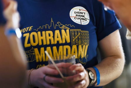 A Mamdani supporter wears a sticker that says ‘I didn’t rank Cuomo.’