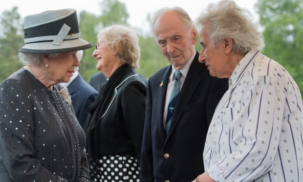 Eric ‘Winkle’ Brown talking to the Queen during her visit to the site of Belsen, Germany, in June last year. In April 1945, Brown, who was fluent in German, had interrogated Josef Kramer, the concentration camp commandant.