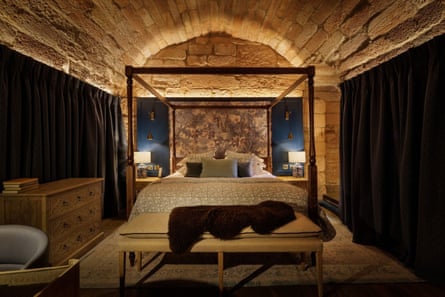 A sumptuous bedroom with four-poster bed