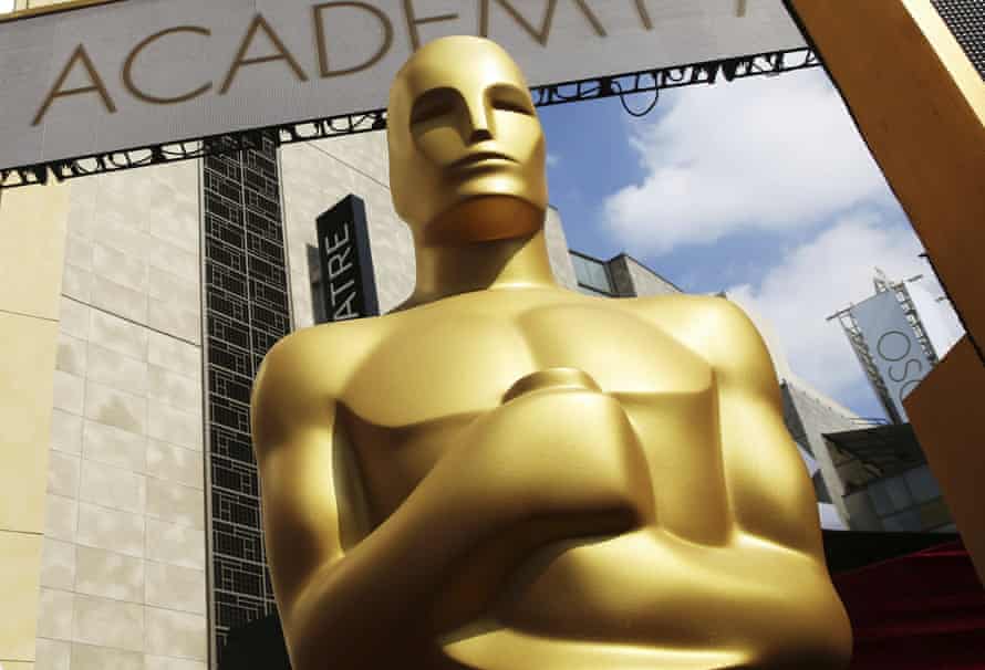 An Oscar statue appears outside the Dolby Theatre for the 87th Academy Awards in Los Angeles in 2015.