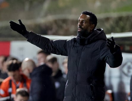 The Celtic manager Wilfried Nancy watches his side miss a host of chances before losing 2-1 to Dundee United.