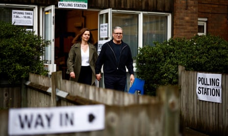 Labour party leader Keir Starmer and his wife, Victoria, leave a polling station in London after voting in local elections on 2 May 2024. 