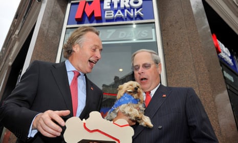 Anthony Thomson and Vernon Hill share a joke outside the first branch of Metro Bank in Holborn, central London.