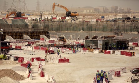 Construction workers building the Al-Janoub Stadium in May 2015.