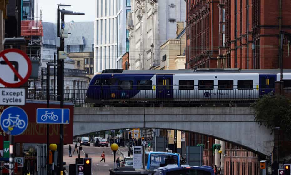 A Northern Rail train passes over Oxford Road in Manchester. 