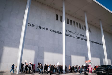 Protesters gather in front of the Kennedy Center after Trump’s name was added to the facade.