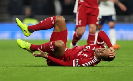 Virgil van Dijk reels from a nasty challenge from Xavi Simons.