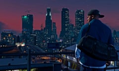 Franklin looks out over the Los Santos skyline in Grand Theft Auto V.