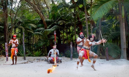 Group of Yugambeh Aboriginal warriors dance during Aboriginal culture show in Queensland, Australia