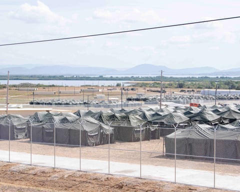 a large expanse of grey tents