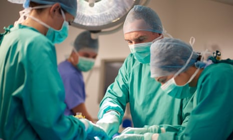 An operation takes place in an NHS hospital