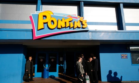 People leave a Pontins building in north Wales