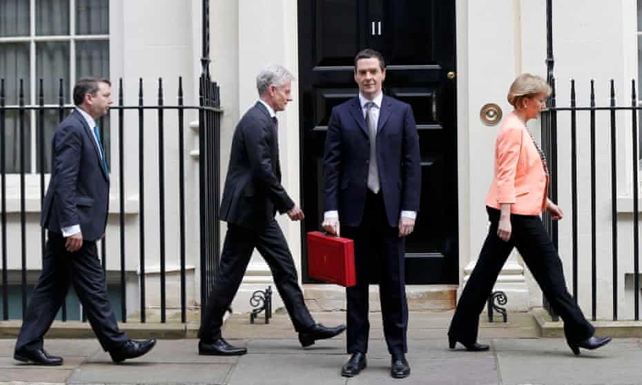  George Osborne with his Treasury team outside number 11 Downing Street, before delivering his budget.