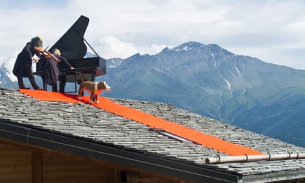 Hitting the high notes: a fiddler on the roof, complete with piano and hound, as part of the Verbier Festival.